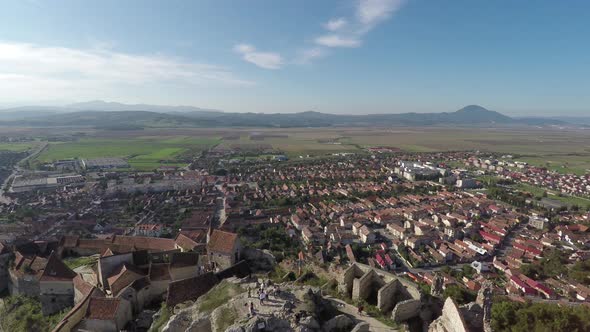 Aerial shot of Rasnov town and fortress
