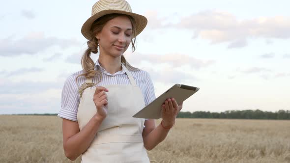 Woman Farmer Straw Hat Smart Farming Standing Farmland Smiling Using Digital Tablet Female