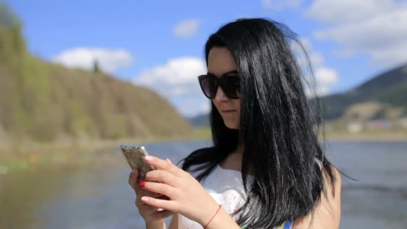 Attractive Woman Using Mobile Phone