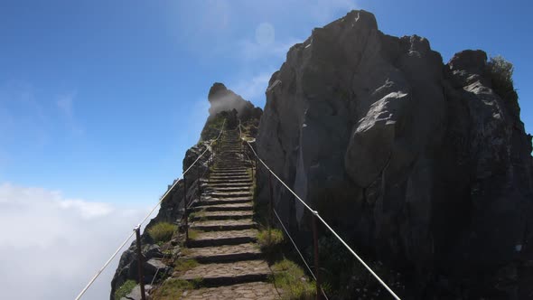 Stairs above the clouds on Pico do Arieiro mountain, Madeira, Portugal