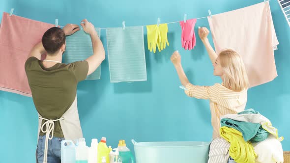 Mad Couple Spending Funny Time in Laundry Room