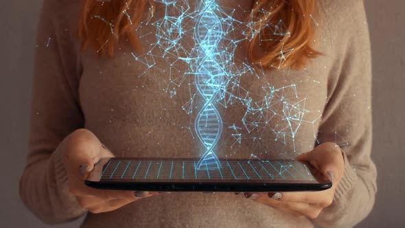 Hologram Screen on a Tablet with Digital Dna Structure and Particles