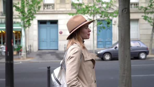 Young Woman is Walking in Paris