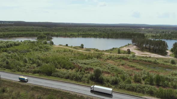 Aerial View of White Truck Passing Busy Highway/ Highway Overpass/ Overdrive/ Bridge