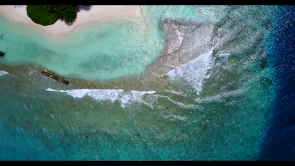 Aerial top view seascape of relaxing seashore beach time by blue water and white sand background of 