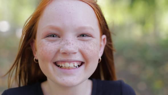 Natural Appearance of a Girl with Beautiful Freckles on Her Face