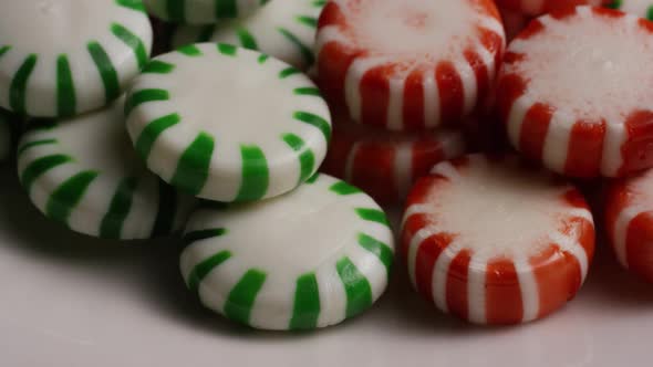 Rotating shot of spearmint hard candies - CANDY SPEARMINT 083