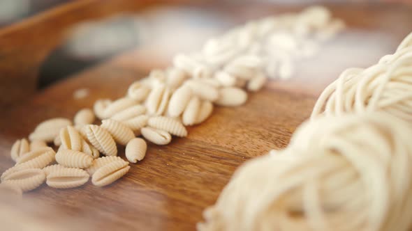 Home Made Pasta on the Table with Flour