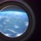 Earth As Seen Through Window Of Spaceship, Flight Of The Space Station Above The - VideoHive Item for Sale