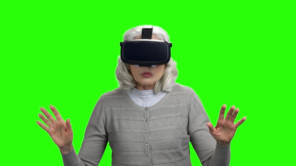 Old Woman Wearing Virtual Reality Glasses