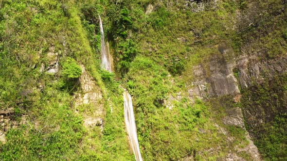 High Cliff with a Waterfall