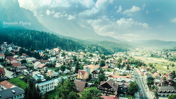 Flying Above Houses in the Mountains