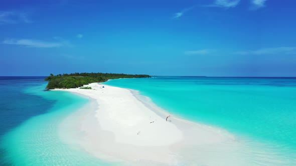 Beautiful flying abstract shot of a white paradise beach and turquoise sea background in best qualit