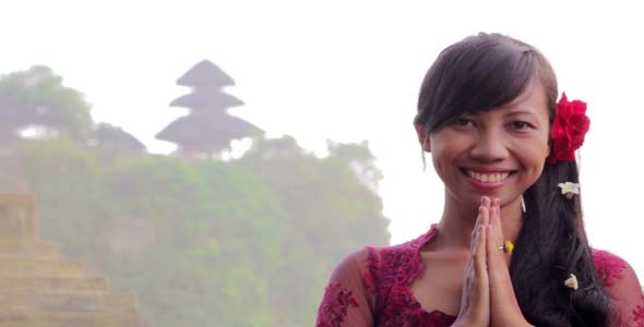Girl Saluting With Both Hands In Bali