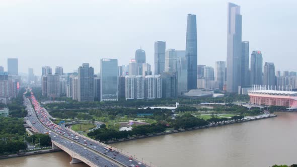 Guangzhou Cityscape China with Boats Traffic and Bridges