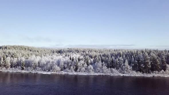 Take off from the river shore shows the endless forests of Finland.