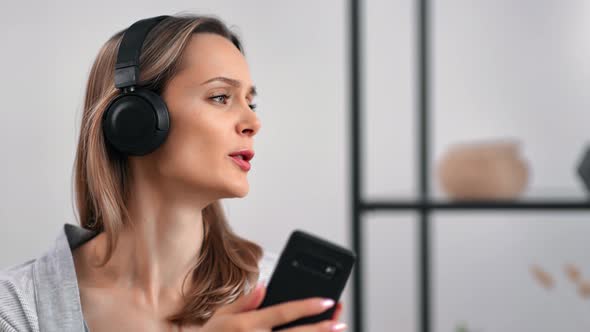 Lady in Headphones Listening Music Singing Song Audio Sound