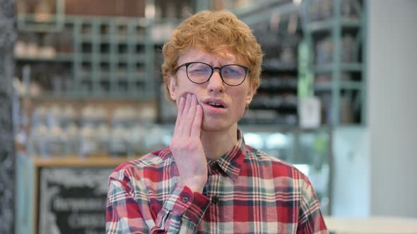 Young Redhead Man with Toothache, Cavity 