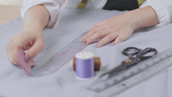 Hand Female Fashion, Designer, Draws On A Piece Of Fabrics