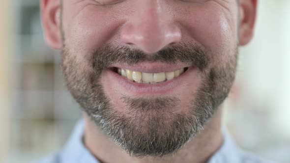 Close Up of Mouth of Smiling Young Man