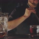 Bartender Prepares a Cocktail at the Bar - VideoHive Item for Sale