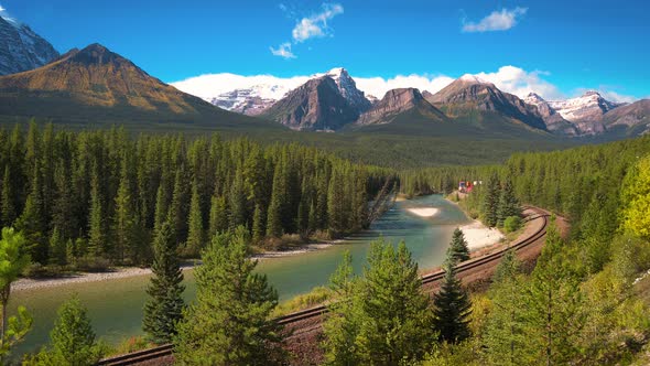 Train Passing Through Morant's Curve in Bow Valley Canada