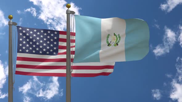 Usa Flag Vs Guatemala Flag On Flagpole