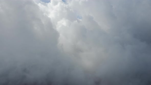 Drone Flight In Grey And White Clouds