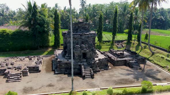 Aerial circling shot of ancient Buddhist temple Ngawen on Java, Indonesia