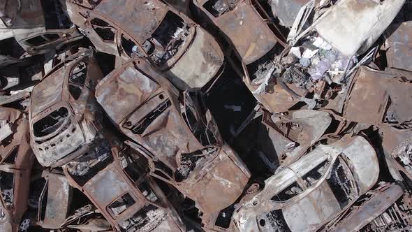 Vertical Video of a Dump of Destroyed Cars During the War in Ukraine