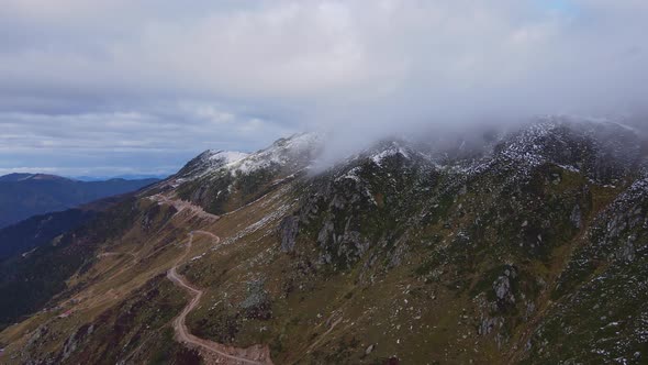 Curve of Serpentine Road in Mountain at Morning