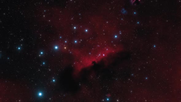 Spaceship Flies Near Red Nebula in Space