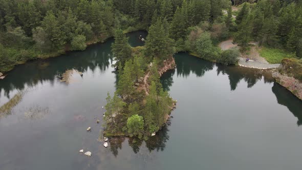 Drone shot of a small island in a lake in Ireland.