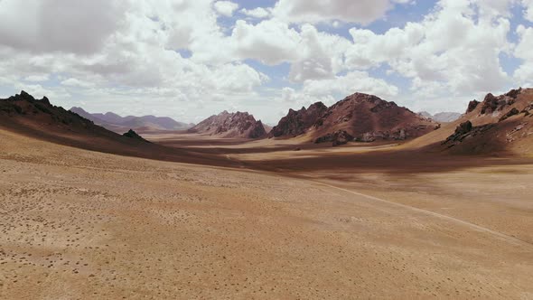 Desert Flying Over a Dune