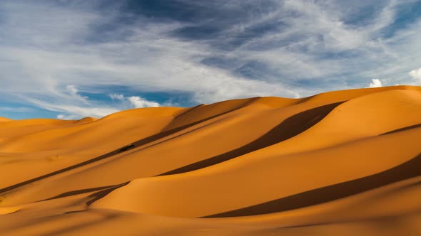 Sunset Over the Sand Dunes in the Desert