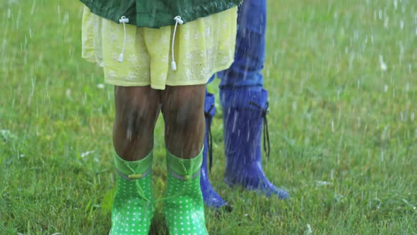 Girl Jumping and Laughing in Rain