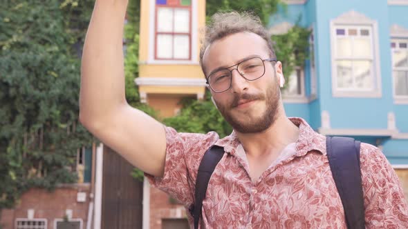 Young man is happy and dancing.