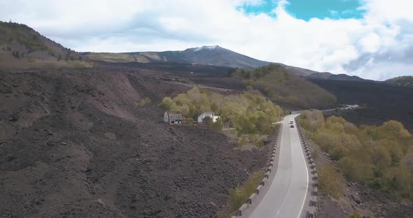 Aerial view of road to Mount Etna or Mongibello Mungibeddu