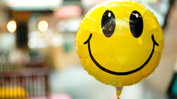 Smiling Balloon Floating In The Air