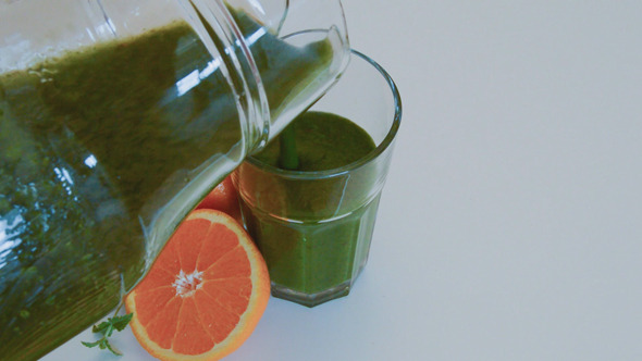 Green Smoothie Poured into Big Glass