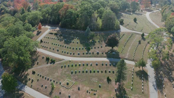 Aerial Drone Shot Flying Over Mt Feake Cemetery Toward Charles River in Waltham