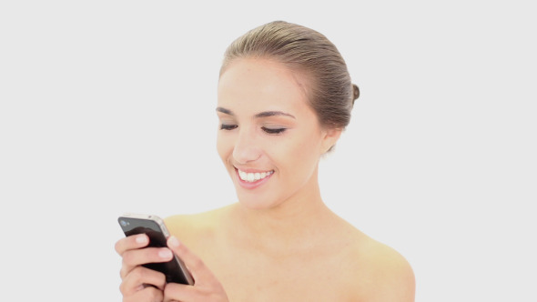 Beautiful Model Texting On Her Smartphone 2