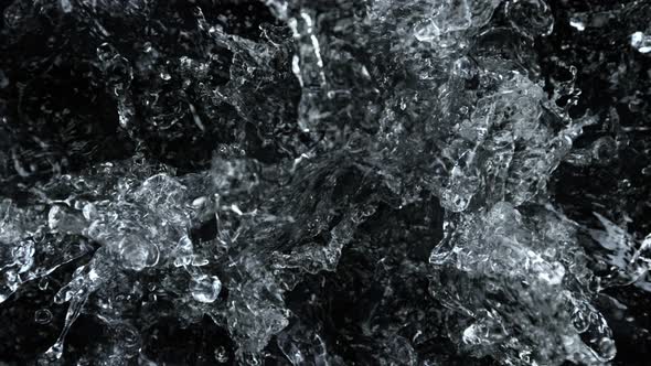 Super Slow Motion Shot of Splashing Water Isolated on Black Background at 1000 Fps alt