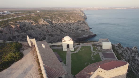 Aerial seascape over looking Atlantic Ocean at Fortress of Beliche Sagres Algarve Portugal.