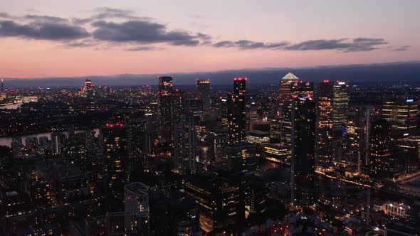 Slide and Pan Aerial Panoramic Shot of City in Evening