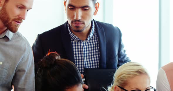 Executives working together at the desk