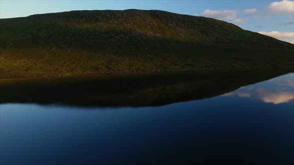 Hill Reflecting in a Lake