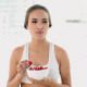 Fit Young Woman Eating A Bowl Of Strawberries - VideoHive Item for Sale