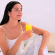 Attractive Brunette Drinking Orange Juice - VideoHive Item for Sale