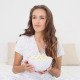 Young Woman Eating Bowl Of Popcorn On Bed 1 - VideoHive Item for Sale